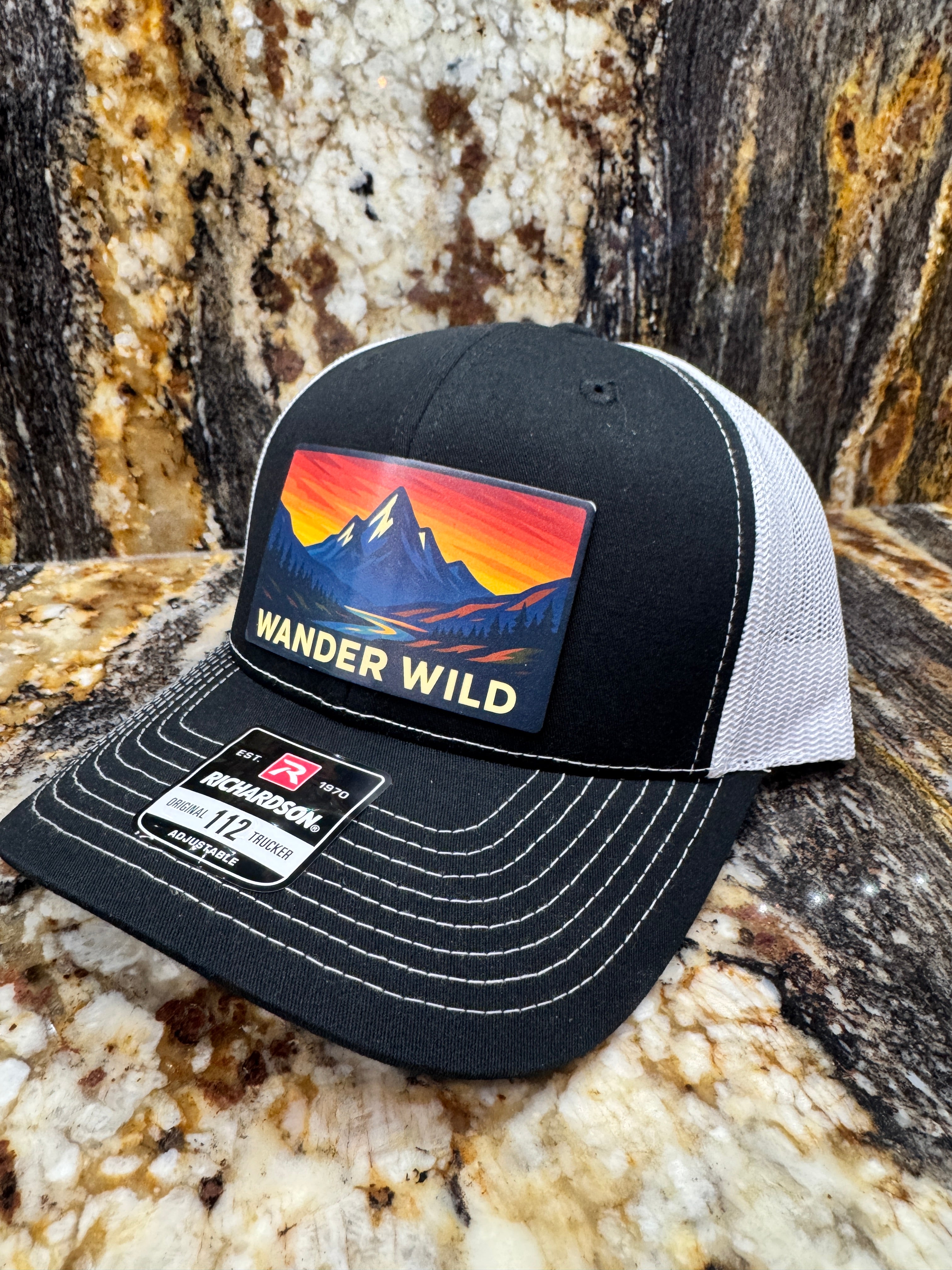 Wander Wild on Black and White Richardson 112 Trucker Hat
